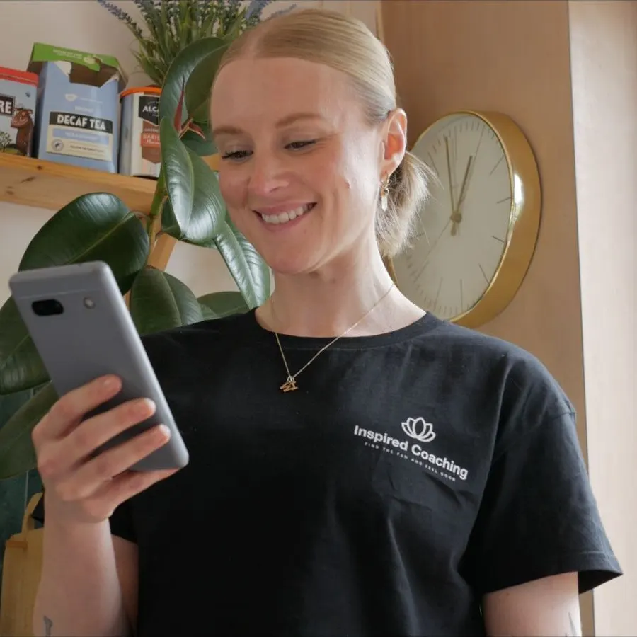 Charlotte checking her results in the calorie calculator